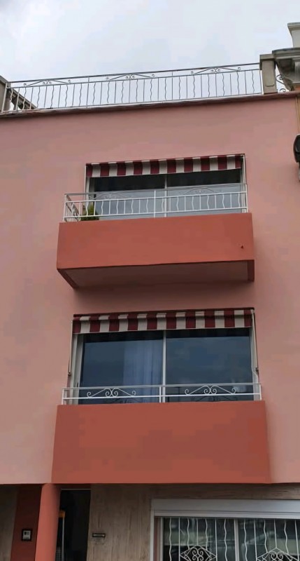 vente et pose (réentoilage)de toile, bâche, tente de store à Marseille 136